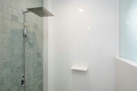 Spa-style rain shower with stone tile Villa Jasmine Koh Samui luxury villa rental Thailand beachside