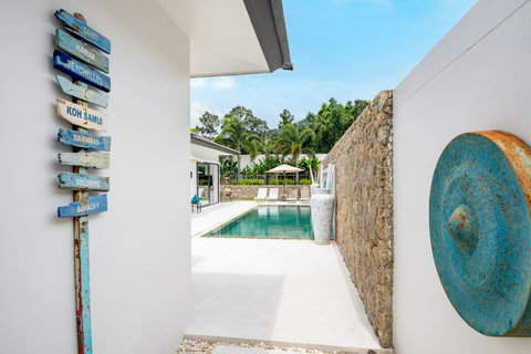 Stylish pool entrance with decorative features Villa Jasmine Koh Samui luxury villa rental Thailand tropical design