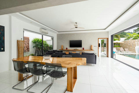 Open concept living and dining with pool terrace Villa Jasmine Koh Samui luxury villa rental Thailand indoor outdoor