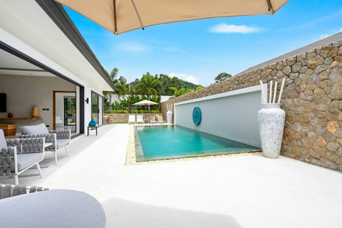 Pool terrace with mountain backdrop Villa Jasmine Koh Samui luxury villa rental Thailand infinity pool outdoor living