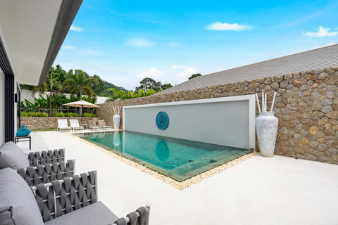 Designer pool deck with artistic features Villa Jasmine Koh Samui luxury private pool villa Thailand resort style
