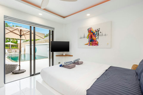 Indoor lounge opening to pool terrace Villa Jasmine Koh Samui luxury villa rental Thailand entertainment room