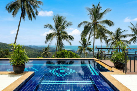Inviting blue-tiled pool with palm-fringed panoramic views of Nathon and the Gulf of Thailand.