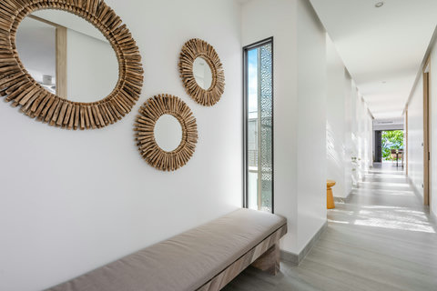 Stylish lounge corner with handcrafted wall decor