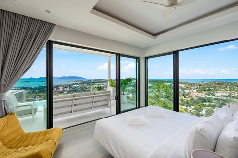 Bedroom retreat with sweeping hilltop views of the coastline