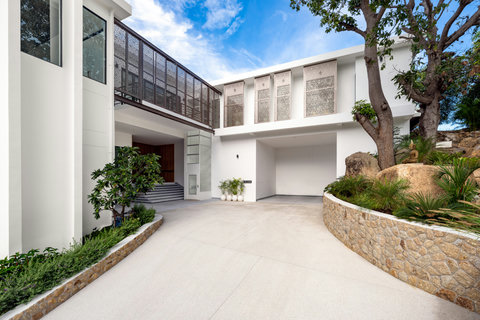 Striking multi-level villa facade with contemporary design