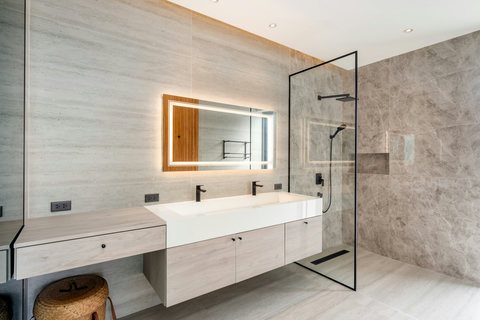 Contemporary kitchen with premium appliances and breakfast bar