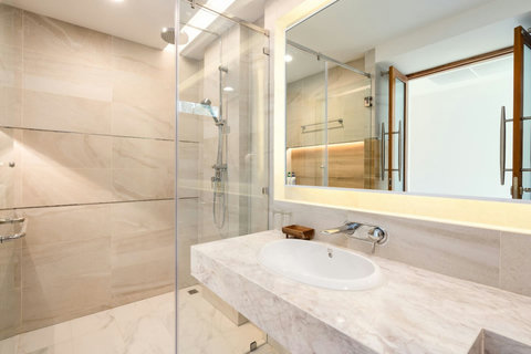 Modern en-suite bathroom at Villa Ariya Koh Samui - Luxury villa rental with contemporary fixtures and rain shower