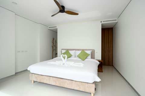 Serene master bedroom at Villa Ariya Koh Samui - King-size bed with premium linens and tropical garden views