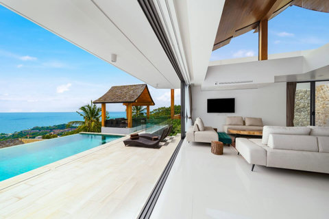 Bright living room at Villa Ariya Koh Samui - Comfortable seating area with outdoor terrace and tropical views