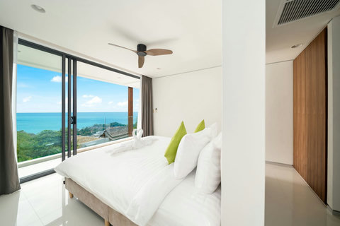 Light-filled lounge at Villa Ariya Koh Samui - Airy open-plan living with garden views and modern decor