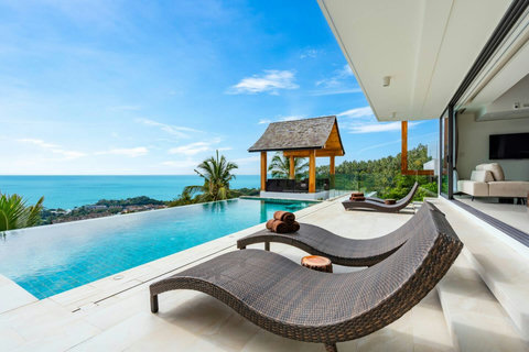 Poolside relaxation at Villa Ariya Koh Samui - Sun loungers by the private pool with ocean and mountain views