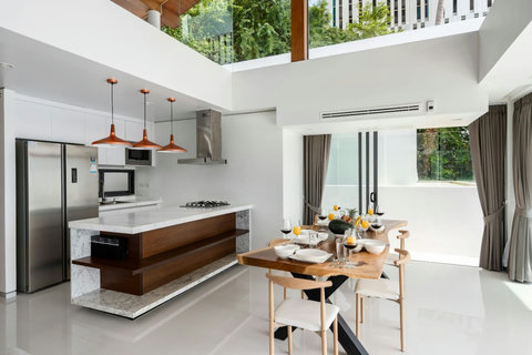 Fully equipped modern kitchen at Villa Ariya Koh Samui - Open-plan dining and kitchen with sleek contemporary design