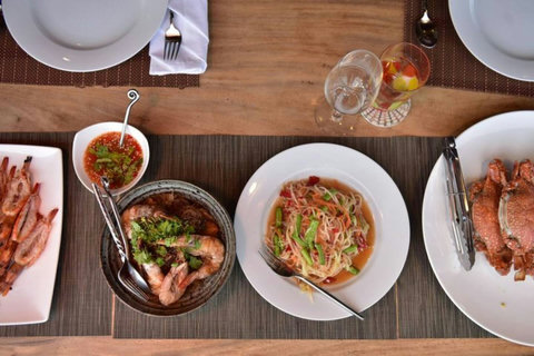Authentic Thai cuisine spread with fresh seafood and local dishes - in-villa dining at Soluna Koh Samui