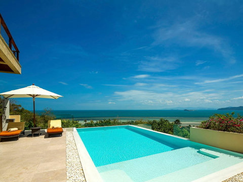 Private infinity pool with stunning turquoise ocean views from Villa Soluna's elevated hillside in Koh Samui