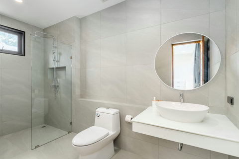 Guest Bathroom - Contemporary Design with Walk-in Shower & Round Mirror