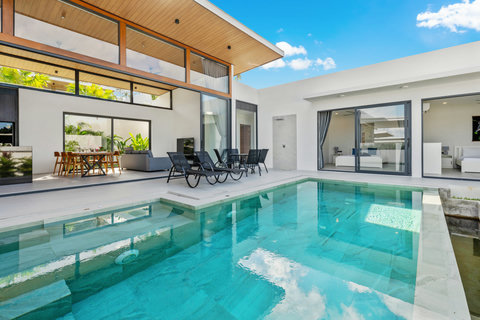 Pool & Sky View - Infinity Edge Pool with Blue Sky & White Clouds
