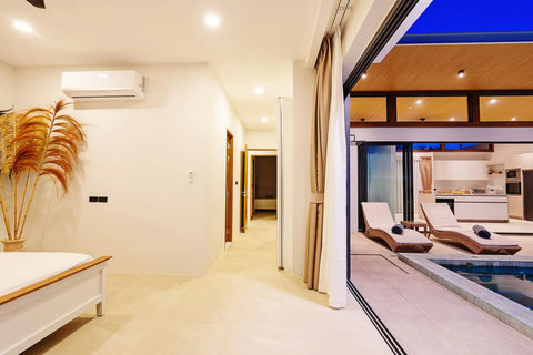 Elegant entrance hallway with modern architecture and seamless indoor-outdoor flow