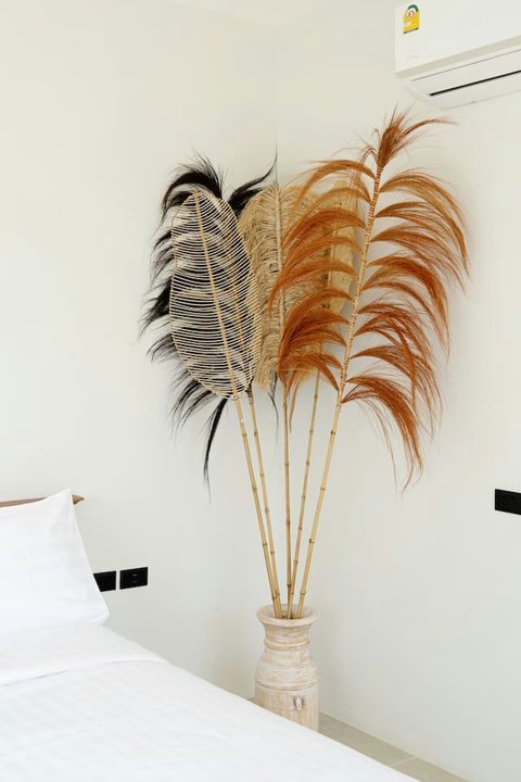 Elegant interior detail with decorative dried palm arrangement