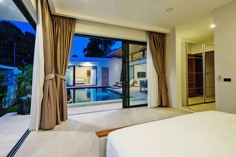Master bedroom with pool terrace access - Direct views and seamless outdoor connection