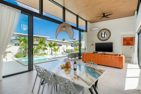 Settle into the living room and watch the pool from your sofa, or step straight outside whenever you like