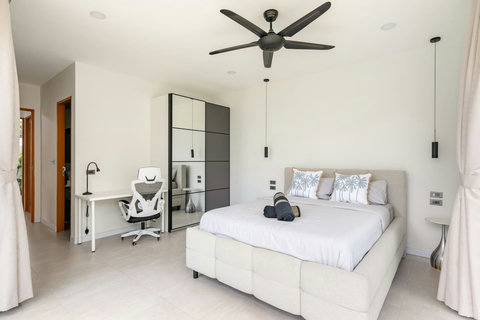 Elegant master suite with contemporary furnishings