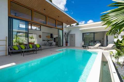 The pool deck is your outdoor living room — room to spread out, swim, and entertain as you wish