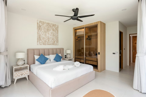 Comfortable guest bedroom with premium linens and tropical decor, Koh Samui holiday villa