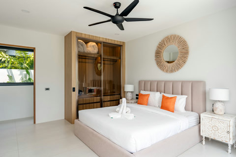Serene third bedroom with natural wood furnishings in Elysium 3BR pool villa, Koh Samui