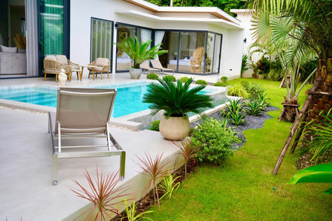 Outdoor pool deck and tropical garden at Bophut Samui vacation villa rental