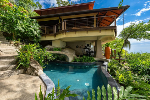 Private infinity pool overlooking Gulf of Thailand at luxury 5-bedroom hillside villa in Santikhiri estate Bang Kao