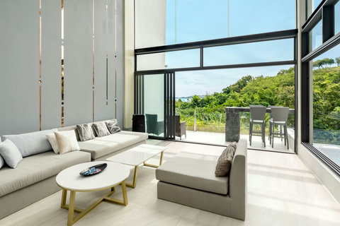 Bright living room with ocean views at Villa J3, Replay Residence Bangrak Koh Samui