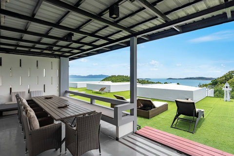 Rooftop dining terrace with panoramic sea view at Villa J3, Replay Residence Bangrak Koh Samui