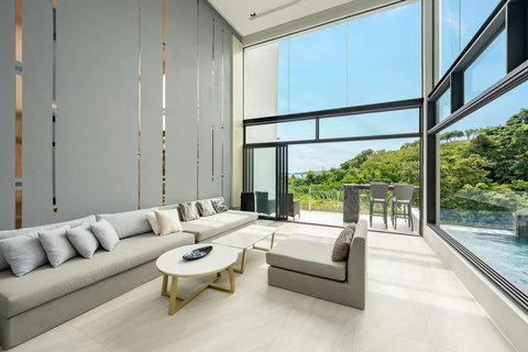 Modern white living room with ocean views at Villa J3, Replay Residence Bangrak Koh Samui