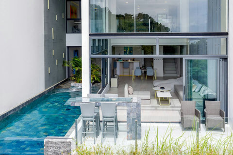 Swimming pool and villa exterior at Villa J3, Replay Residence Bangrak Koh Samui