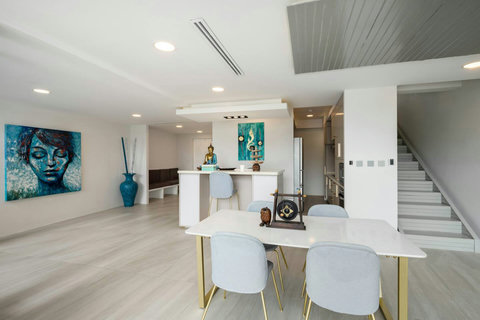 Modern open interior with designer staircase at Villa J3, Replay Residence Bangrak Koh Samui