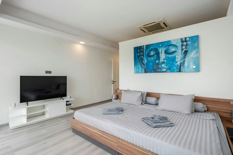 Stylish bedroom with designer cushions at Villa J3, Replay Residence Bangrak Koh Samui