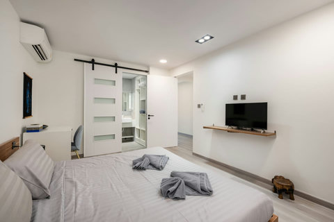 Bright bedroom with balcony access at Villa J3, Replay Residence Bangrak Koh Samui