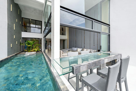 Private pool terrace with outdoor lounge at Villa J3, Replay Residence Bangrak Koh Samui