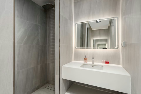 Bathroom with designer vanity and rain shower at Villa J3, Replay Residence Bangrak Koh Samui