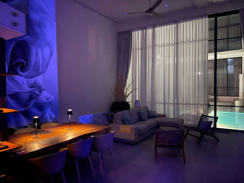 Futuristic blue-lit interior design at Villa Q1, modern Koh Samui vacation home