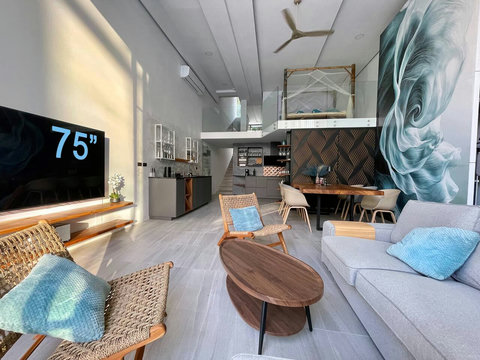Entertainment room with 75-inch TV at Villa Q1, Replay Residence Bangrak