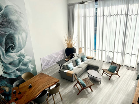 Indoor relaxation area with tropical plants at Villa Q1, Bangrak Koh Samui