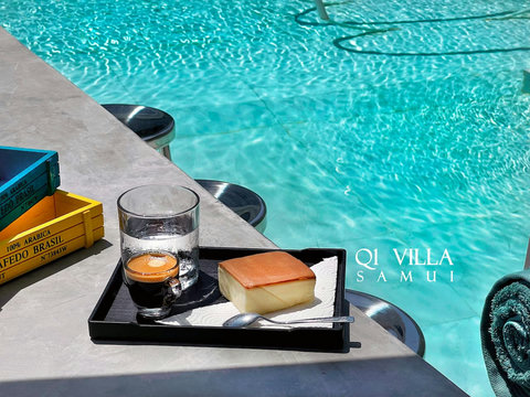 Illuminated night pool at Villa Q1, Replay Residence Bangrak Koh Samui Thailand