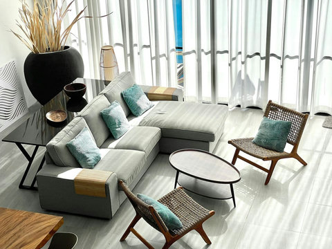 Outdoor lounge seating with teal cushions at Villa Q1, Koh Samui vacation rental