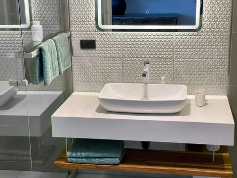 Modern bathroom with designer vessel sink at Villa Q1, Replay Residence Koh Samui