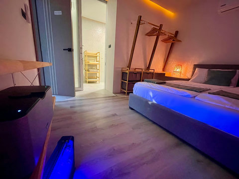 Bedroom with blue LED lighting at Villa Q1, Replay Residence Koh Samui