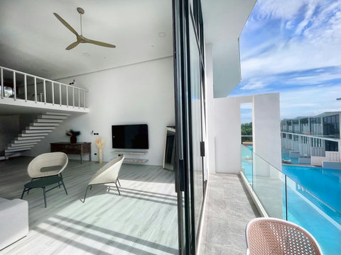 Private terrace with balcony seating at Villa Q1, Replay Residence Koh Samui