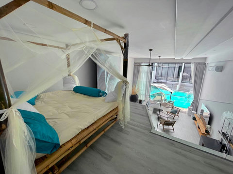 Stylish bedroom with modern decor at Villa Q1, Bangrak Koh Samui holiday rental