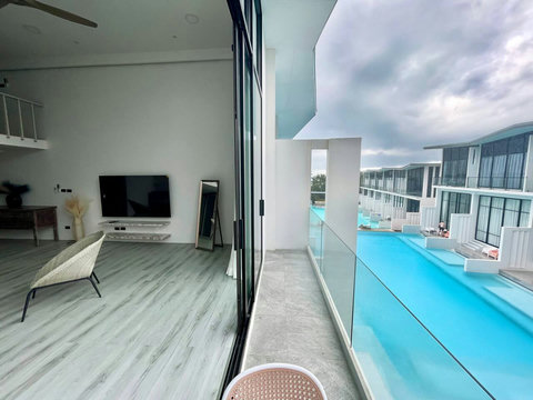 Bedroom with terrace access and garden views at Villa Q1, Bangrak Koh Samui